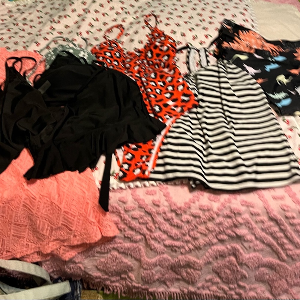 Lot of swimwear, bottoms, tops, suit and coverup. Size medium and one small.